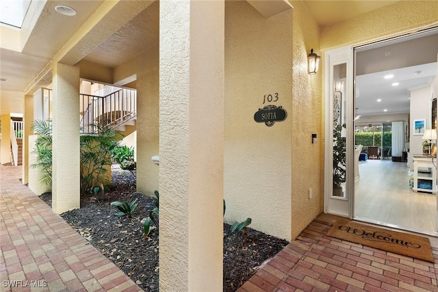 790 W Elkcam Cir Unit 103, Marco Island, FL 34145 - property entrance featuring stucco siding
