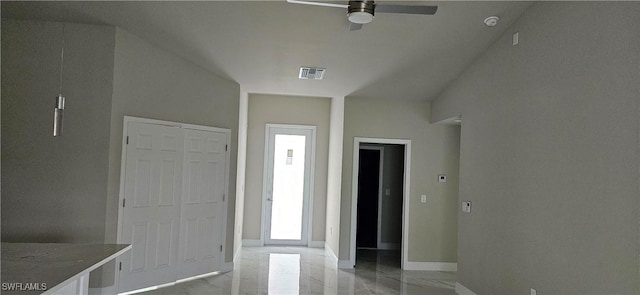 entryway featuring ceiling fan