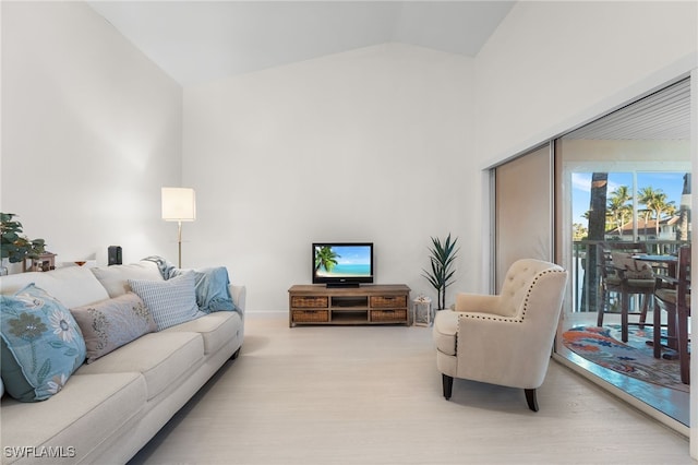 living room with lofted ceiling