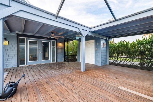 deck featuring french doors and ceiling fan