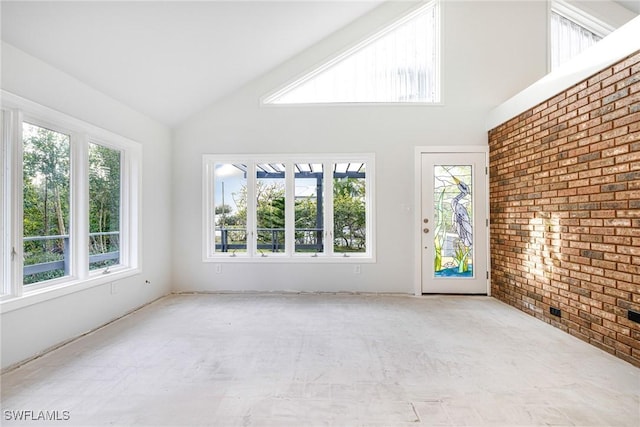 unfurnished sunroom with vaulted ceiling