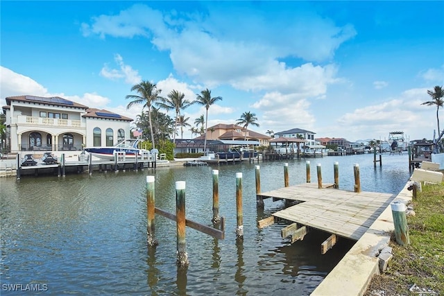 dock area with a water view