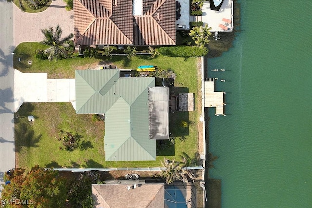 birds eye view of property featuring a water view