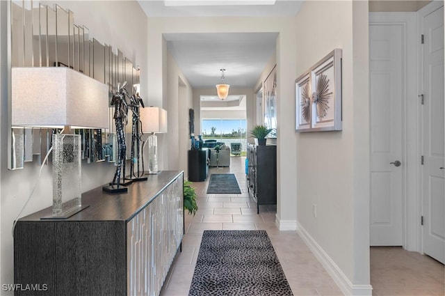 hallway with light tile patterned floors