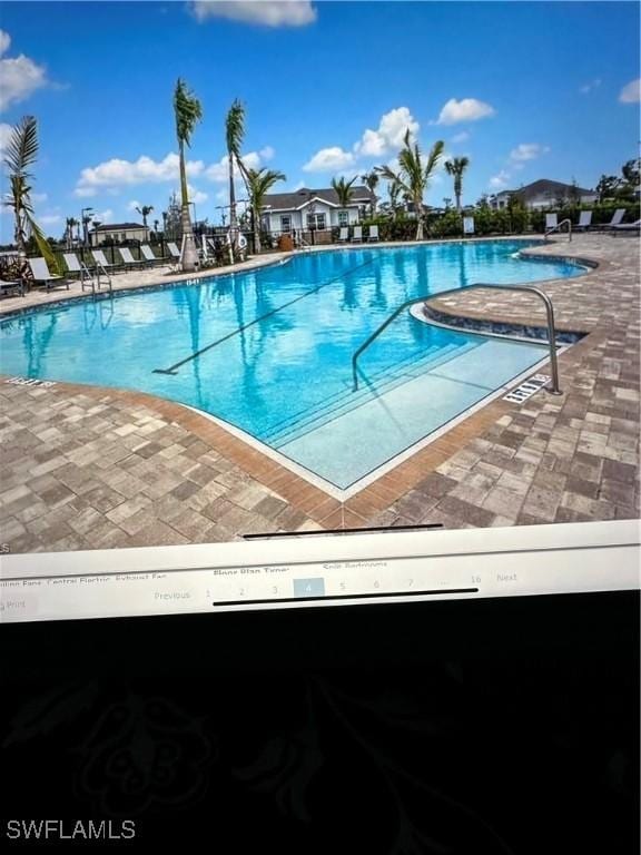 community pool with a patio