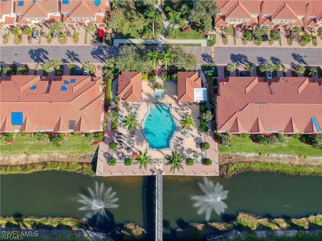 birds eye view of property featuring a water view