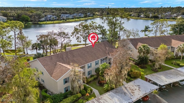 birds eye view of property featuring a water view