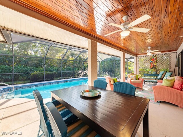 exterior space with a patio, ceiling fan, and a lanai