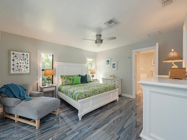 bedroom with hardwood / wood-style floors and ceiling fan