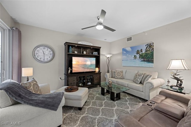 living room featuring ceiling fan