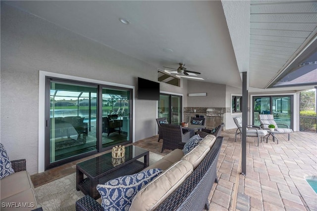 view of patio / terrace featuring outdoor lounge area, ceiling fan, and area for grilling