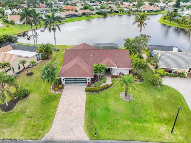 drone / aerial view featuring a water view