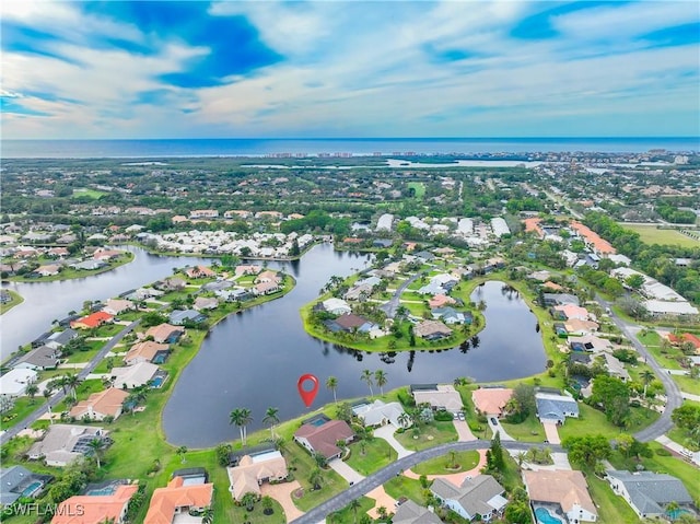 bird's eye view with a water view