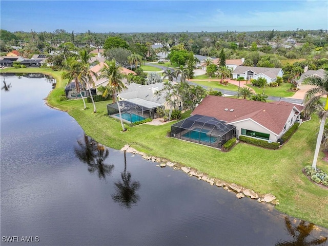 drone / aerial view with a water view