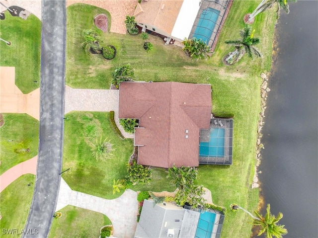 drone / aerial view with a water view