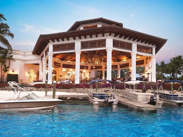 view of pool with a dock