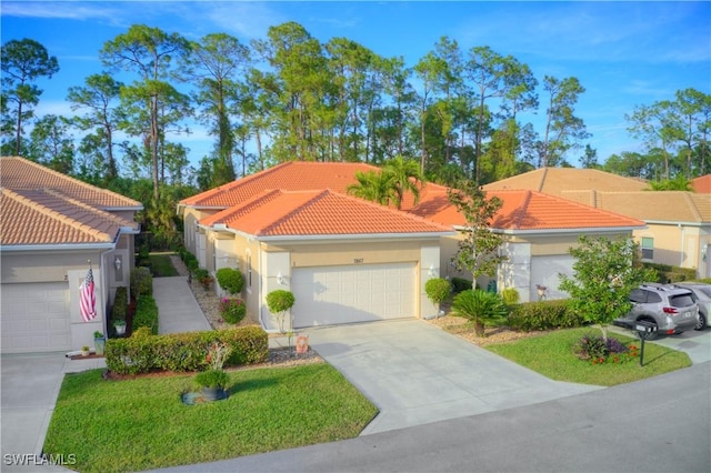 mediterranean / spanish-style house featuring a garage