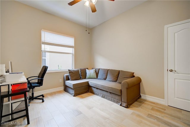 office featuring ceiling fan and light wood-type flooring