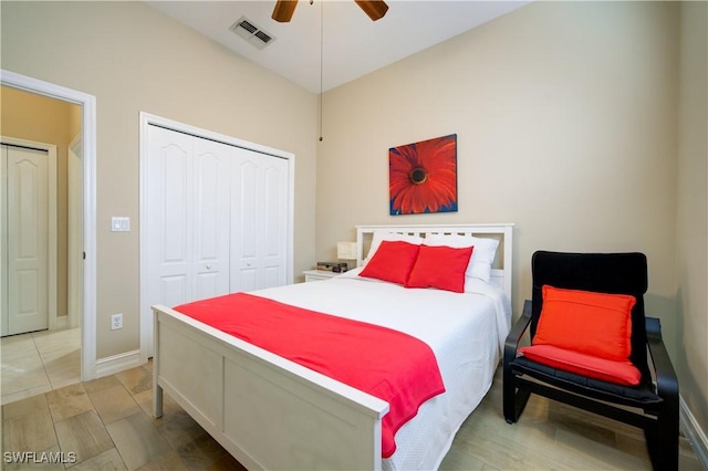 bedroom featuring ceiling fan and a closet