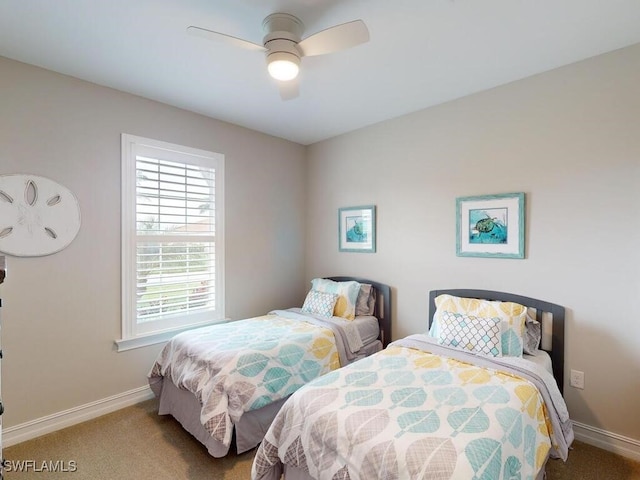 bedroom featuring ceiling fan and carpet floors