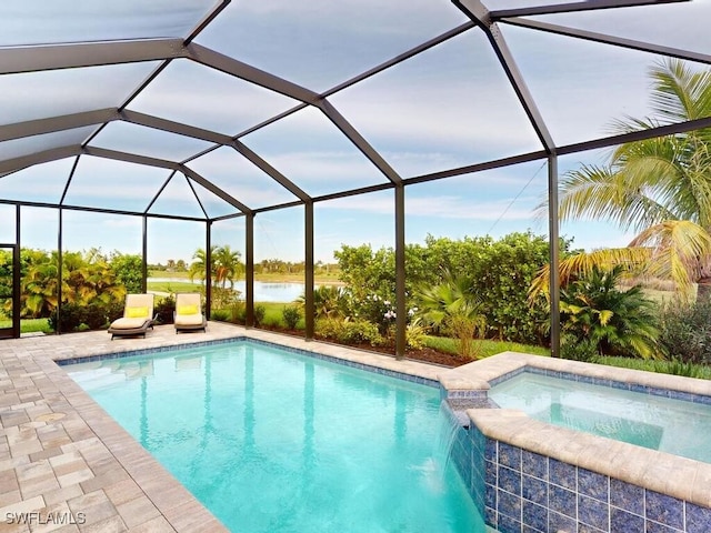 view of swimming pool featuring an in ground hot tub, pool water feature, a water view, and a lanai