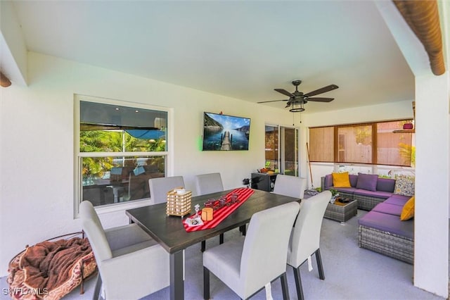 dining space featuring ceiling fan