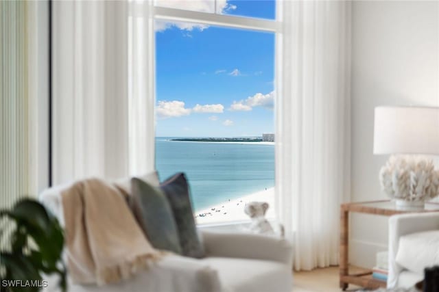 living area with a water view