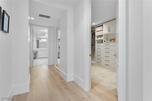 hall featuring light hardwood / wood-style flooring