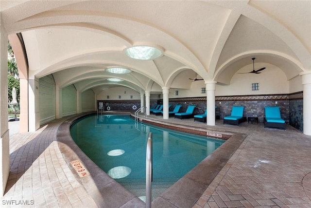 view of swimming pool featuring ceiling fan