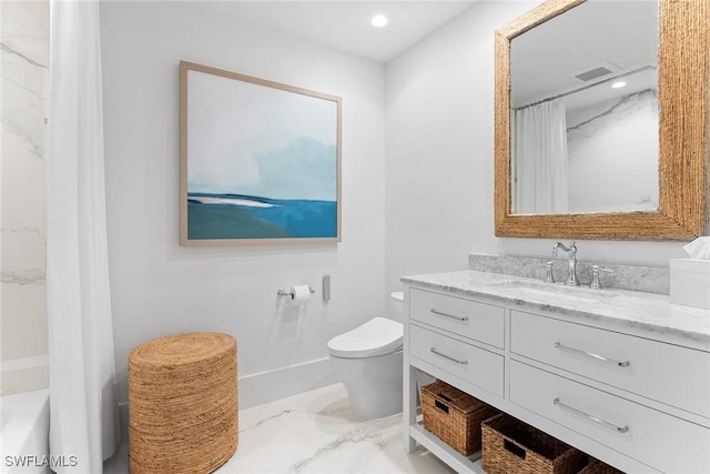 bathroom with walk in shower, vanity, and toilet