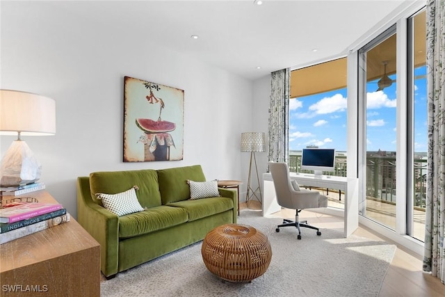 office area featuring floor to ceiling windows