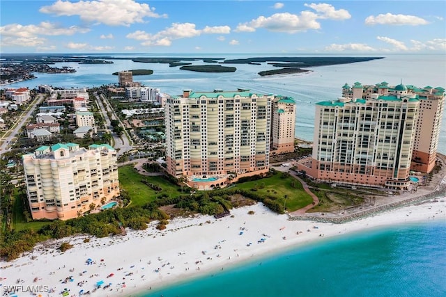 aerial view featuring a water view and a beach view