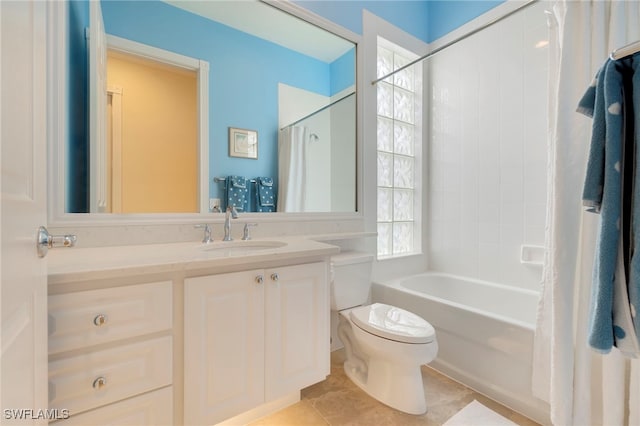 full bathroom featuring shower / bathtub combination with curtain, tile patterned flooring, vanity, and toilet