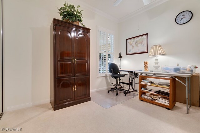 carpeted home office featuring ornamental molding