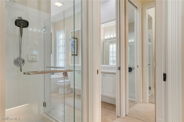 bathroom featuring crown molding, an enclosed shower, and toilet