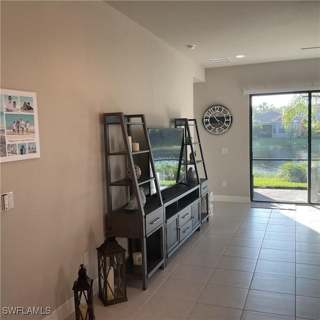 living room with light tile patterned floors