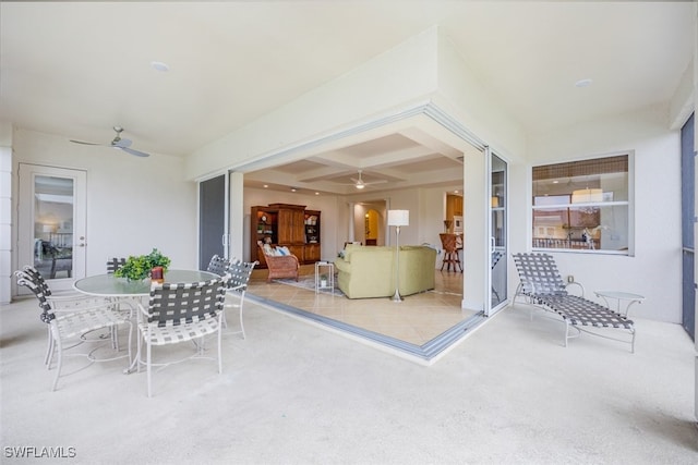 view of patio featuring ceiling fan