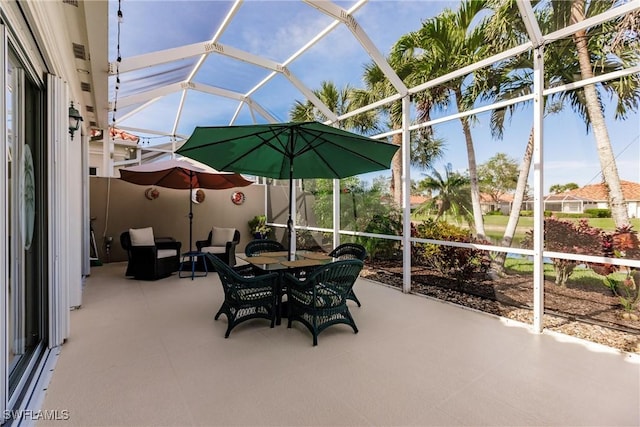 view of patio with a lanai