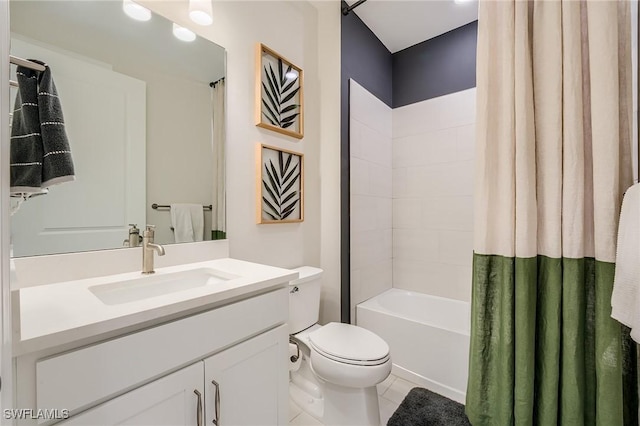 full bathroom featuring tile patterned flooring, vanity, toilet, and shower / bath combo with shower curtain