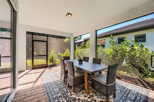 sunroom featuring a healthy amount of sunlight