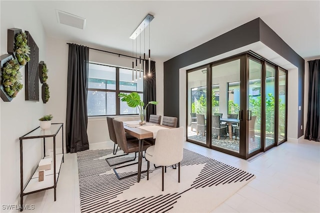 dining space featuring french doors