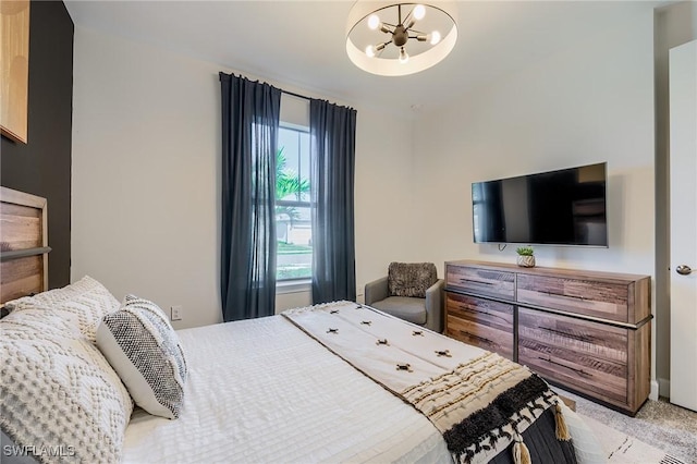 carpeted bedroom with an inviting chandelier and multiple windows