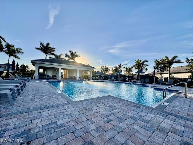 view of swimming pool featuring a patio area