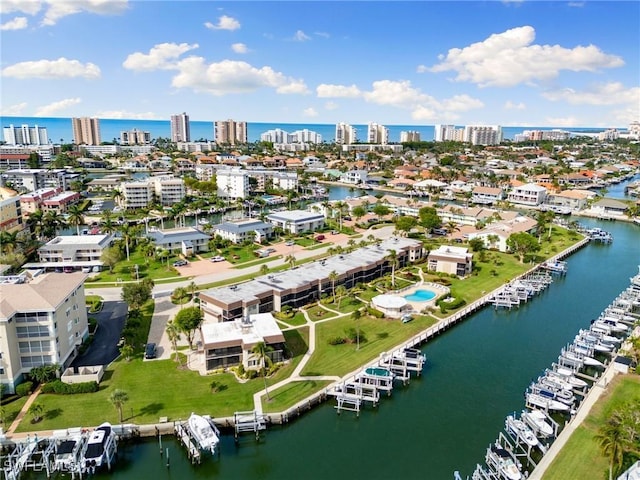 birds eye view of property featuring a water view