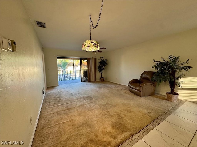 unfurnished room featuring carpet