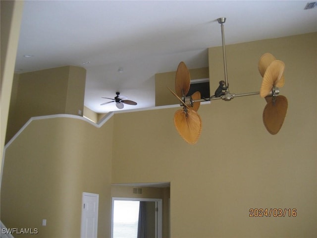 interior details featuring ceiling fan