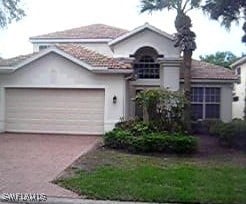 view of property featuring a garage