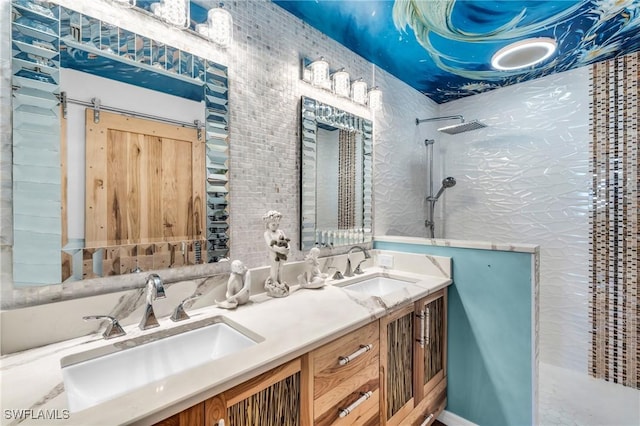 bathroom featuring vanity and a shower