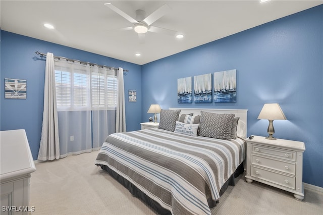 carpeted bedroom with ceiling fan