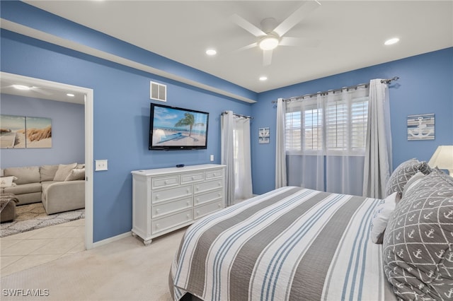 carpeted bedroom with ceiling fan